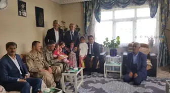 Kaymakam Dundar ile Başkan Ensari, şehit aileleri ve gazilerle bayramlaştı