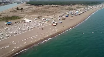 Antalya'da çardaklarda denize sıfır ücretsiz tatil yapıyorlar