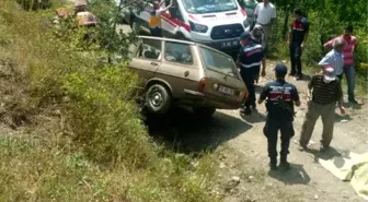 Frenleri boşalan otomobilin altında can verdi