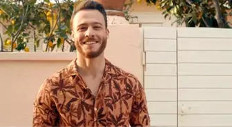 Yakışıklı oyuncu Kerem Bürsin Ege'nin keyfini çıkarıyor