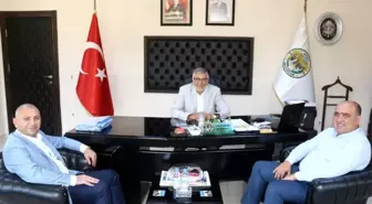 MHP'den Başkan Bozkurt'a hayırlı olsun ziyareti
