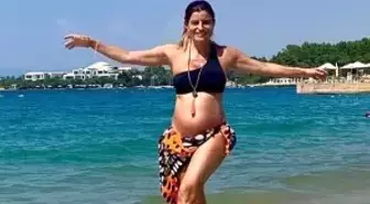 6 aylık hamile olan sunucu Ece Vahapoğlu plajda fenalaştı