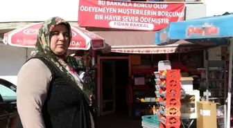 Veresiye defterindeki borçları kapattı, 'Borcunuz ödendi pankartı' astırdı