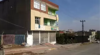 Eşinin üzerinde benzin döküp ateşe verdiği kadın, ikinci kattan atlamış