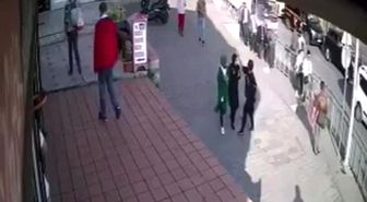 Başörtülü kıza yumruklu saldırı kamerada