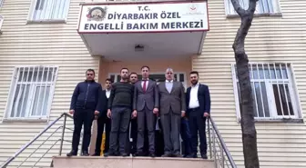 MHP'den bakımevindeki yaşlılara ziyaret