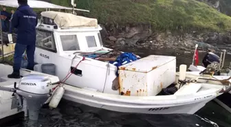 Muğla'da fırtınada teknesi kıyıya vuran balıkçı kayboldu