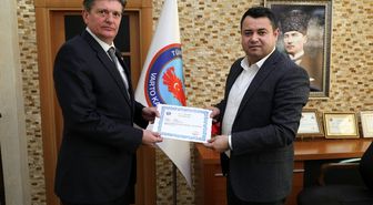 Kaymakam Avcı'dan emniyet müfettişi olan Şahin'e başarı belgesi