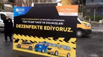 İstanbul'da Harem'de kurulan istasyonda taksi ve dolmuşlar dezenfekte ediliyor