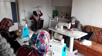 Tomarza Belediyesinin desteği ile gönüllü kadınlar maske üretmeye başladı