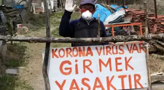 Evinin önüne 'Korona virüs var girmek yasaktır' yazdı