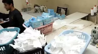 (Özel) İstanbul'da 1 milyon adet sahte maske üreten atölyeye baskın kamerada
