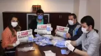 Bolu'da yerel gazete abonelerine maske dağıttı