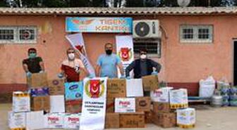 Gazetecilerden 37 aileye gıda yardımı