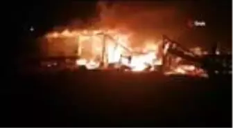 Alev alev yanan ağıl küle döndü