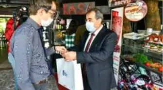 Büyükşehir'den iş yerlerine dezenfeksiyon ve maske dağıtımı