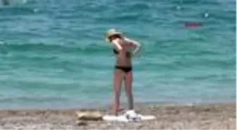 ANTALYA 'BRONZLAŞAYIM DERKEN CİLDİNİZ ERKEN YAŞLANMASIN'