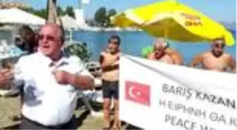 MUĞLA Datça'da kulaçlar, dünya barışı için atıldı