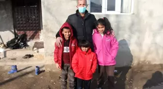 Muhtar Başaran'dan ihtiyaç sahiplerine kıyafet yardımı