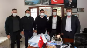 Tütüncü'den muhtarları doğum günlerinde yalnız bırakmadı