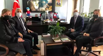 DATÜB heyeti, Erzincan İl Göç İdaresi Müdürü Kaan Özlok'u ziyaret etti