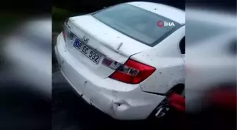 Asma köprünün halatları kopunca aracıyla köprüde asılı kaldı