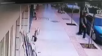 Bir kadının balkondan düşüp yaralanma anı güvenlik kamerasına yansıdı