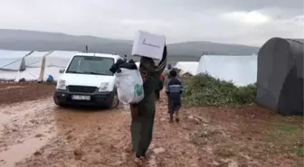 Hatay ve Suriye'de ihtiyaç sahibi ailelere gıda ve kıyafet yardımı yapıldı