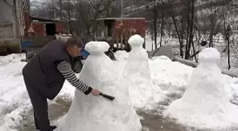 Gezmek istediği Peri Bacalarının kardan heykelini yaptı