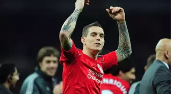 Liverpool'un eski futbolcusu Daniel Agger, futbolu bıraktıktan sonra dövme sanatçısı oldu