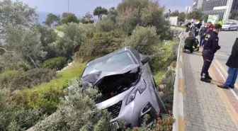 Ehliyetsiz sürücü şarampole uçtu; 2 yaralı