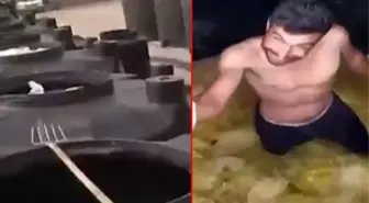 Mide bulandıran görüntü! Fabrika çalışanı turşu tankına çıplak ayakla girip oyun oynadı
