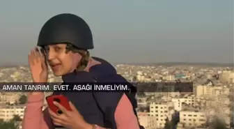 İsrail'in bombardımanına canlı yayında yakalanan kadın muhabir zor anlar yaşadı