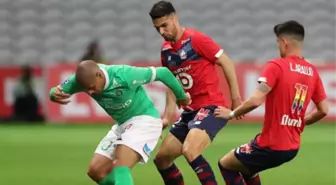 Lille, sahasında Saint-Etienne'le berabere kalarak şampiyonluğu son haftaya bıraktı