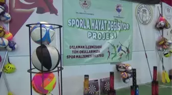 Dalaman'da 'Sporla Hayat Değişiyor' projesi kapsamında okullara spor malzemeleri verildi