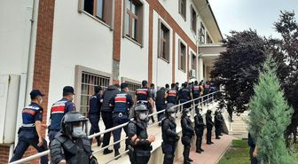 Robocop kıyafetli jandarma ekipleri eşliğinde adliyeye sevk edildiler