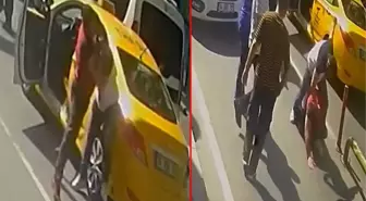 Taksici ve yolcunun kısa mesafe kavgası kamerada