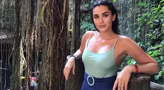 Fazla kilolarıyla objektiflere takılan Hande Doğandemir, mayoyla spor yaptı