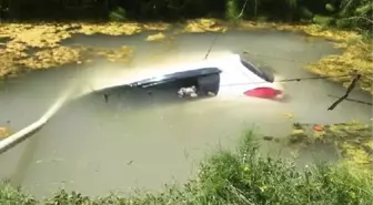 Sulama göledine uçan otomobilin sürücüsü ve eşi yaralandı