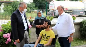 Başkan Hamit Kılıç'tan akülü tekerlekli sandalye yardımı