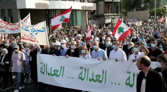 Beyrut'taki patlamanın yıldönümünde binlerce Lübnanlı sokaklara döküldüGüvenlik güçleri ile protestocular arasında arbedede 56 kişi yaralandı