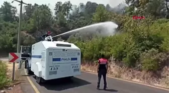 POLİS TOMA'LARI YERLEŞİM YERLERİNE 80 METRE KALA YANGINI SÖNDÜRDÜ