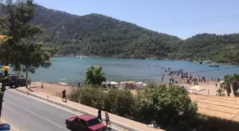 Marmaris'in önemli turizm bölgelerinden Kızkumu Plajı'nda hayat normale dönmeye başladı