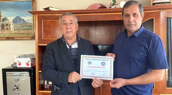 Ünsal'dan Aras'a teşekkür belgesi