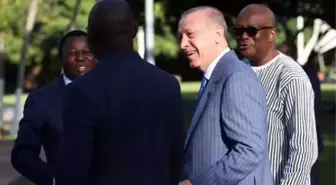 Erdoğan, kahkaha attığı fotoğrafın perde arkasını anlattı: Eski futbolcu Weah ile bir espri üzerine gülümsedik