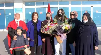 Şampiyon çiçeklerle karşılandı
