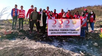 Türk Kızılay Kadirli Şubesi, 'İsimlerle Yeşeren Fidanlar Şenlendirme Projesi' ile fidanları toprakla buluşturmaya devam ediyor