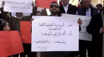 Libyalılar, seçimlerin ertelenmemesi talebiyle gösteri düzenledi