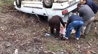 Taklalar atan otomobilden sağ kurtuldular