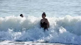 Tourists enjoyed swimming on the first day of the year in Antalya